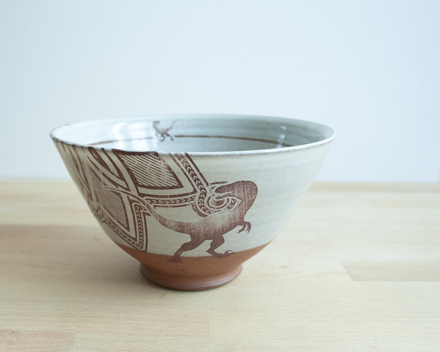 Velociraptor Noodle Bowl with background pattern - white