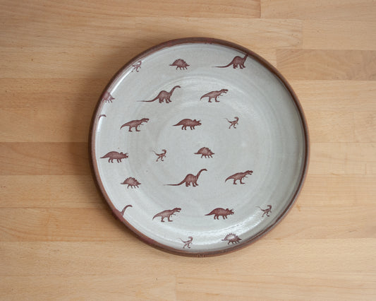 Plate with small dinosaur pattern - white